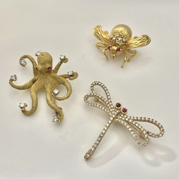 Octopus, dragonfly, and bee pins